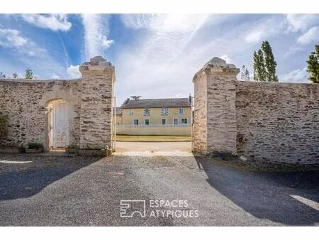 maison familiale d'exception avec piscine chauffée et grandes dépendances à carquefou grav