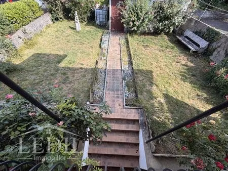 maison de ville avec garage  terrasse et jardin