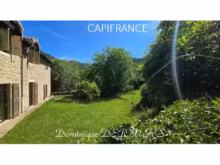 grande maison bourgeoise de 400m² habitable et son parc de 9700m²au bord de la rivière la.