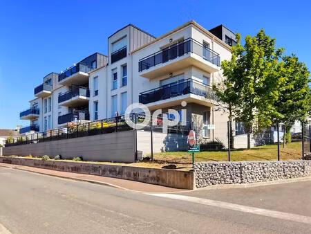 appartement à vendre de 53 m² avec terrasse et deux place de parking en sous sol