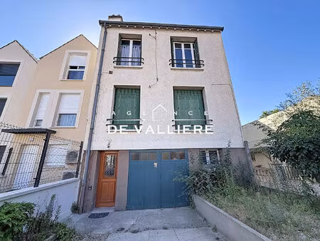 maison 115m² divisée en 3 appartements.