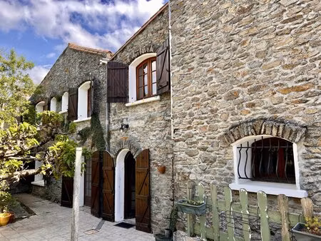 maison de village en pierre avec jardin et garage proche de montolieu