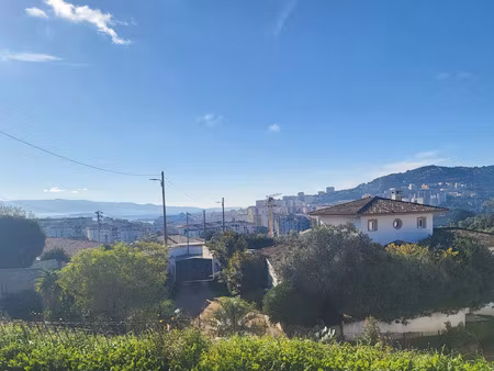 terrain constructible de 1300m2 - a 2km du centre-ville