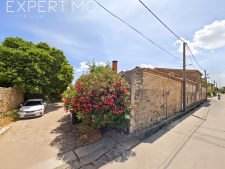 propriété de 420 m2 habitable sur 2000 m2 de terrain au coeur de la ville de poussan.