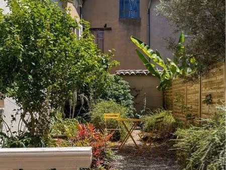t2 avec jardin privatif en plein centre de belleville-en-beaujolais