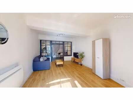 duplex 72 m² rénové — centre-ville  place de la halle