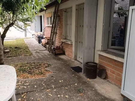 vends terrain+ maison centre ville