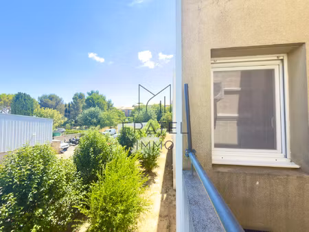 t2 avec terrasse  climatisation et cadre de vie privilégié