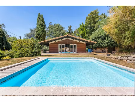 maison chalet sur les hauteurs de limonest  avec piscine