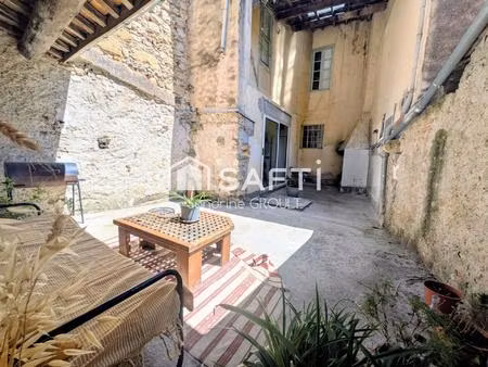 maison de village avec grand garage+ appartement+studio