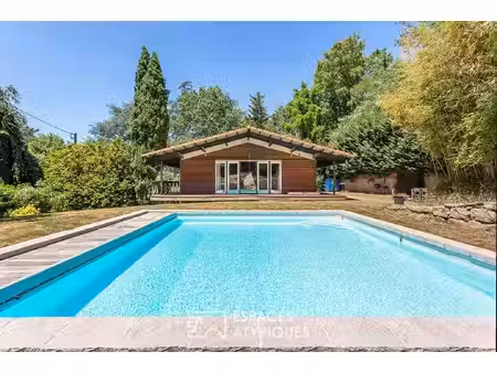 maison chalet sur les hauteurs de limonest  avec piscine