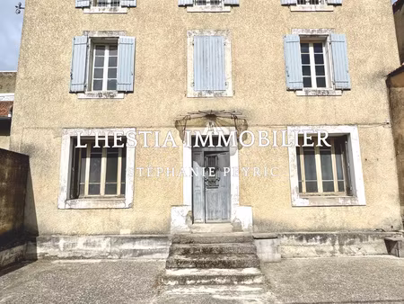 a vendre maison avec cour comprenant 4 logements