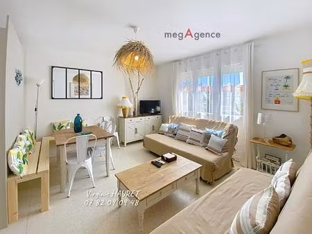 appartement 65m² - 2 chambres - 1 buanderie - 1 place de parking