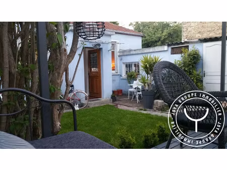 maison 4 pièces de 80 m² avec jardin et garage