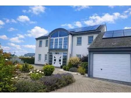 maison 4 ch.  2 sdb. avec jardin à manhay