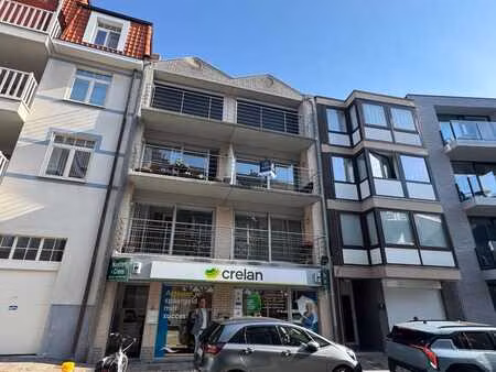 appartement avec terrasse ensoleillée en plein centre-ville