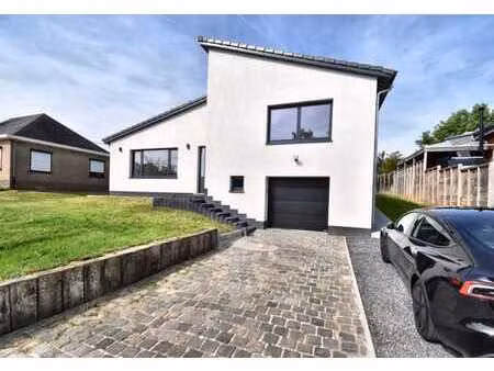 maison rénovée avec jardin et garage à overijse
