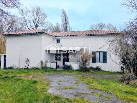 ferme de caractère avec dépendances et beau potentiel