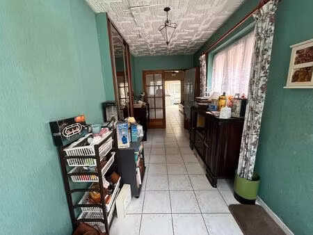 maison semi individuelle avec jardin en fond d'impasse avec garage