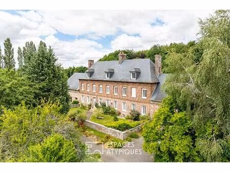 propriété équestre d'entraînement avec maison de maître