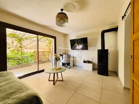 maison rénovée avec terrasses et jardin