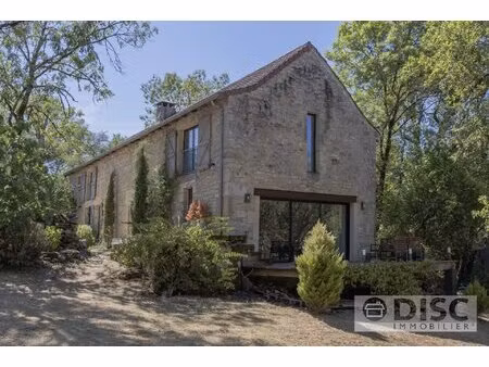 belle maison en pierre mêlant charme et modernité avec terrain constructible  à 5 minutes 