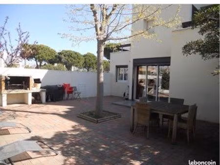 appartement de 70 m2 avec cour privative
