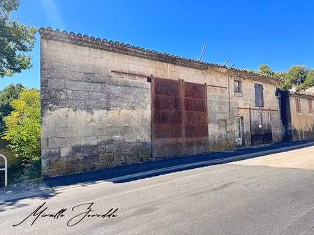 jonquieres saint vincent  ancien atelier en pierre de 240m²