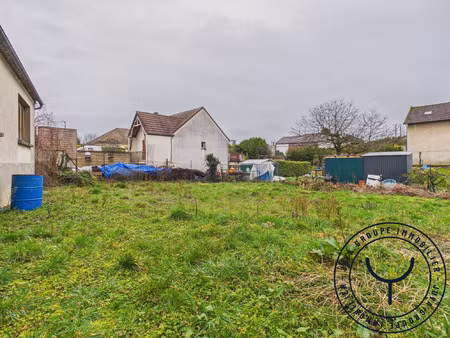 terrain à bâtir avec garage et remise