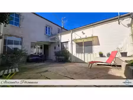 ensemble immobilier : maison 4 ch + garage atelier – idéal artisan ou projet mixte – secte