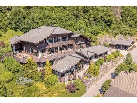morzine – chalet de 528 m² – 7 chambres – piscine intérieure  spa & vues panoramiques