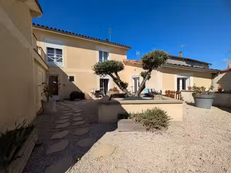 immeuble rentable en centre de village