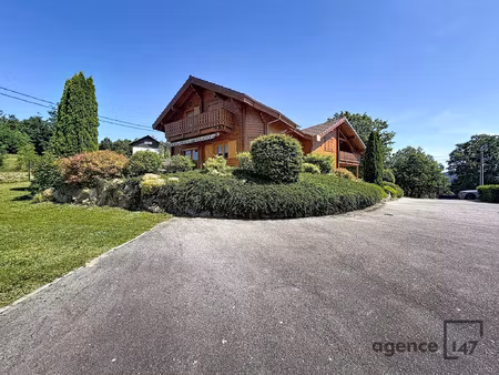 magnifique propriété de 2 chalets vue lac plein sud