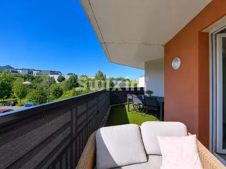 appartement t3 de 55m2 avec terrasse  cave et parkings!
