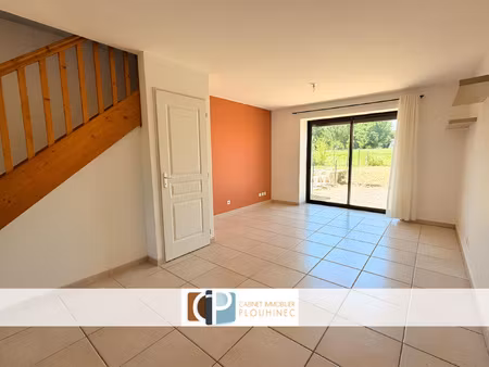 appartement 70 m2 avec garage et jardin.
