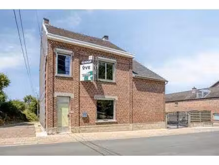 maison caractère avec potentiel dans un environnement calme