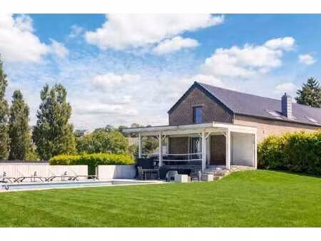 propriété avec 12.600 m² de terrain  prairie et dépendances