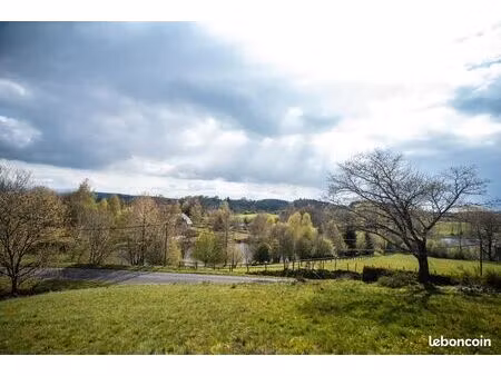 terrain constructible 6 176 m² avec permis - vue exceptionnelle lac de lastioulles et mont