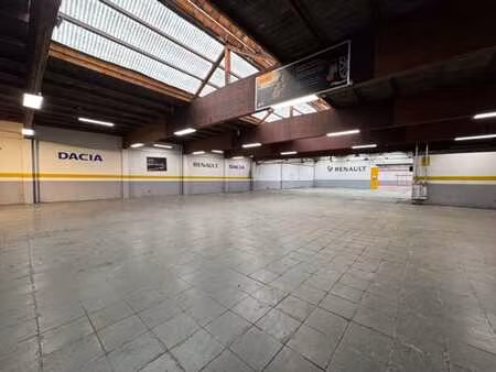 espace commercial avec atelier  dépôt et jardin