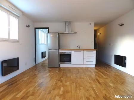 t2 + terrasse + 2 places de parking