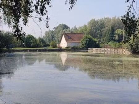 propriété avec étang de peche