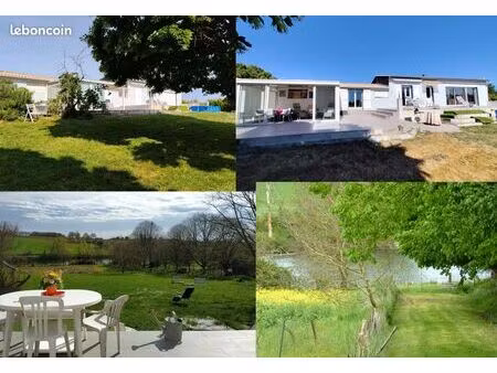 rare maison vue sur lac  grand terrain