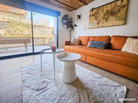 coup de cœur assuré appartement de caractère 65 m² avec jardin privatif et 2 parkings – ce