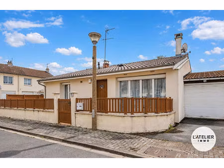 maison de plain-pied avec double garage et jardin