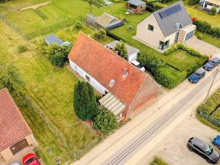 à vendre: projet (de rénovation)  12 ares dans une rue calme