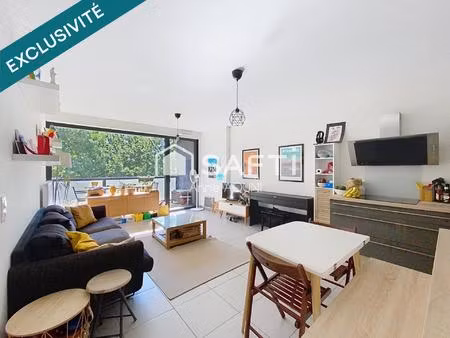 t4 avec terrasse + balcon/ 2 places de parking