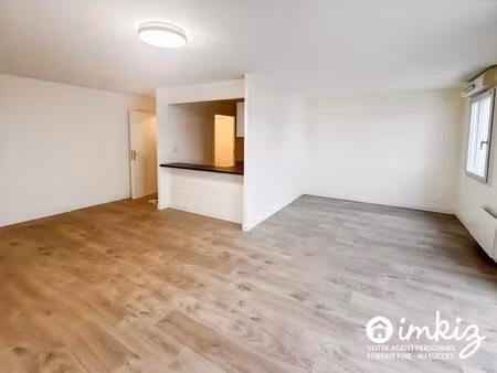 4 pièces de 62 m²  comme neuf vue jardin parking