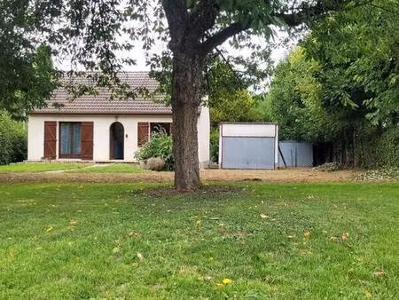 plein-pied 64m²  2 ch + véranda + garage + abris / terrain 1180m².