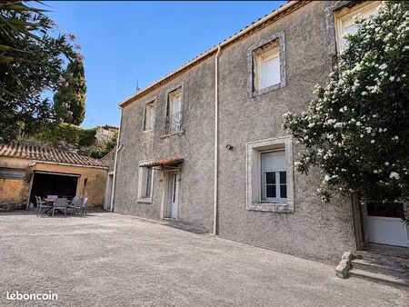 appartement ff4 avec garage et bel extérieur en plein coeur du village