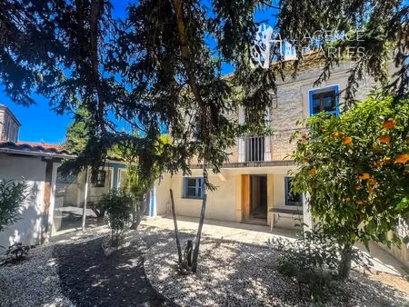 arles chabourlet – maison en pierre avec jardin arboré et garage